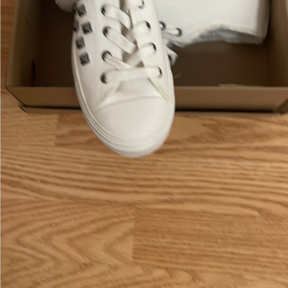 Steve Madden White Sneakers with studs 
size9 1/2 M .. worn once.
